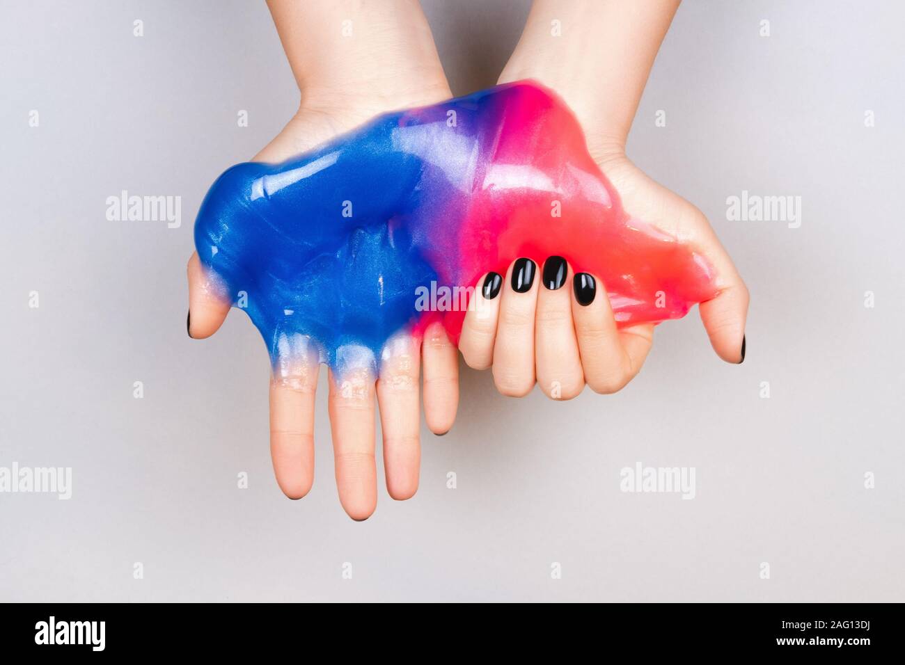 Colorful slime in hands